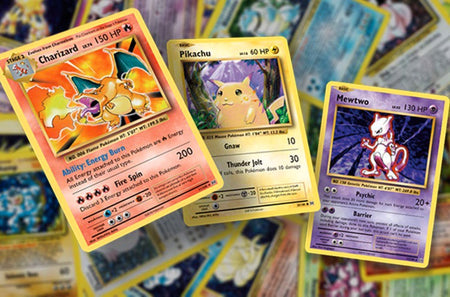 Collection of 1st edition Pokémon cards featuring Charizard, Pikachu, and Mewtwo